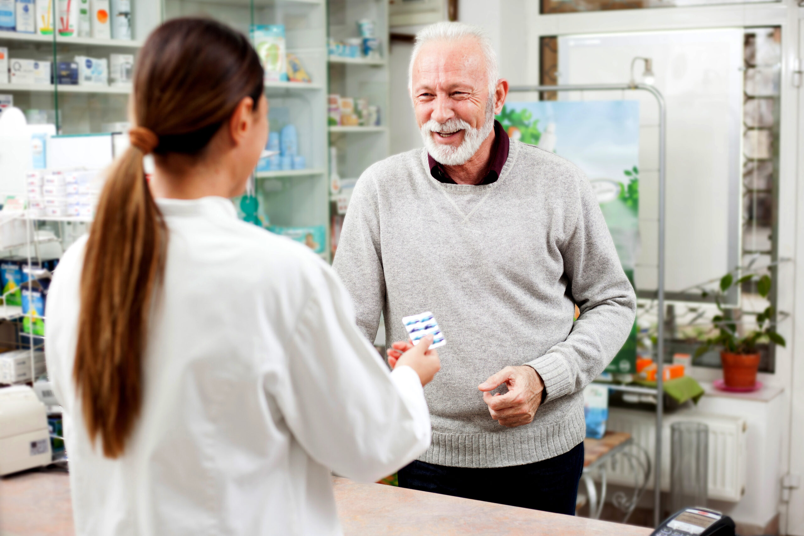 Pharmacist helping a patient